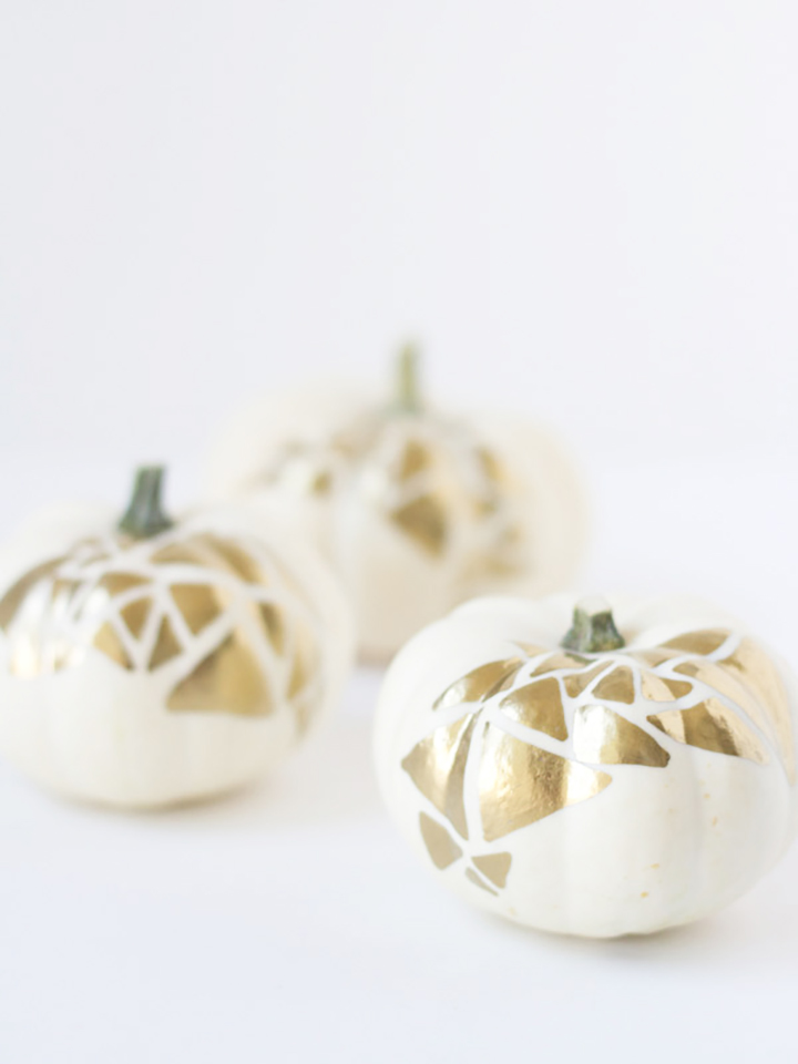 DIY tutorial for these gorgeous gold painted pumpkins from Lovely Indeed