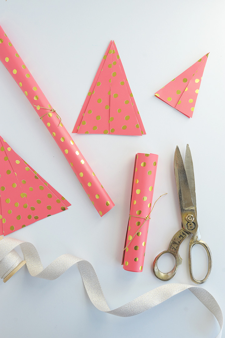 Make these sweet paper Christmas trees out of wrapping paper!