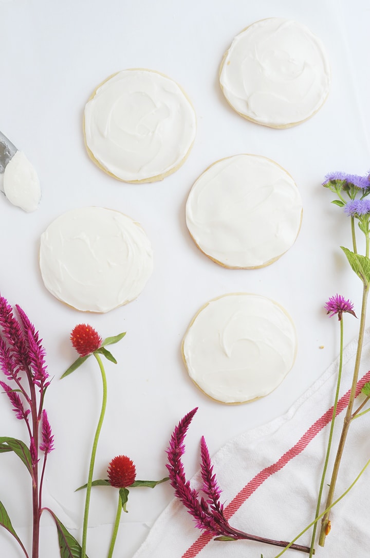 The Best Sugar Cookie Recipe! Top them with a mini fresh flower bouquet for a special touch.