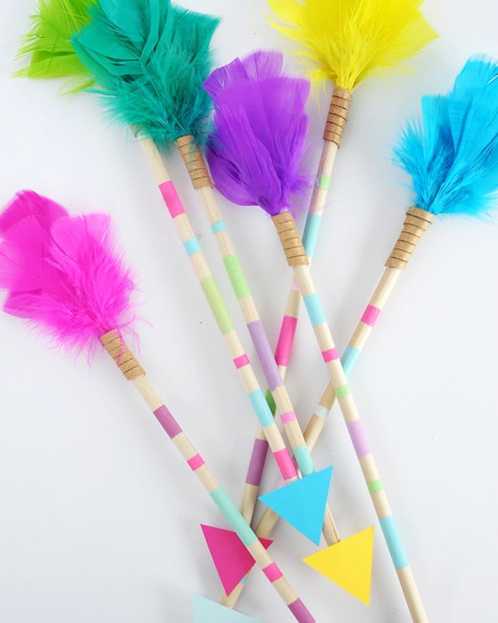 Learn how to make these simple DIY Feather Arrows to hang on the wall.