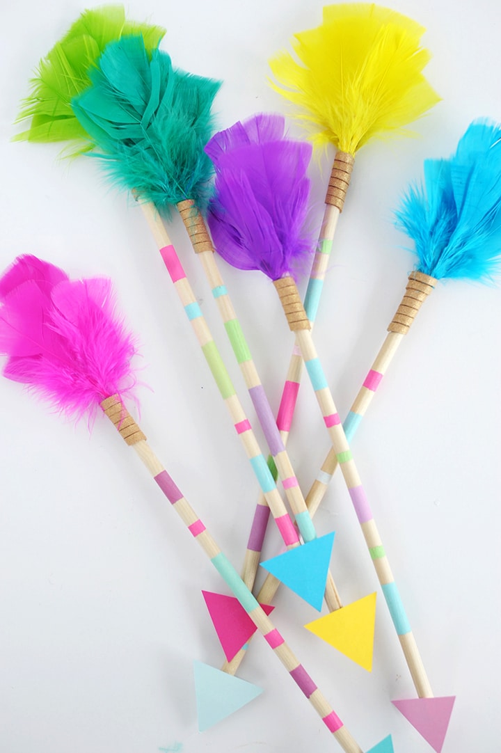 Learn how to make these simple DIY Feather Arrows to hang on the wall.