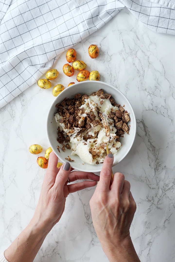 Everyone will absolutely love this Butterfinger Easter Ice Cream Cake!