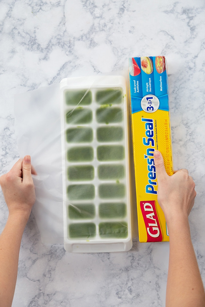 Freeze pureed spinach and kale in ice cube trays for green smoothies