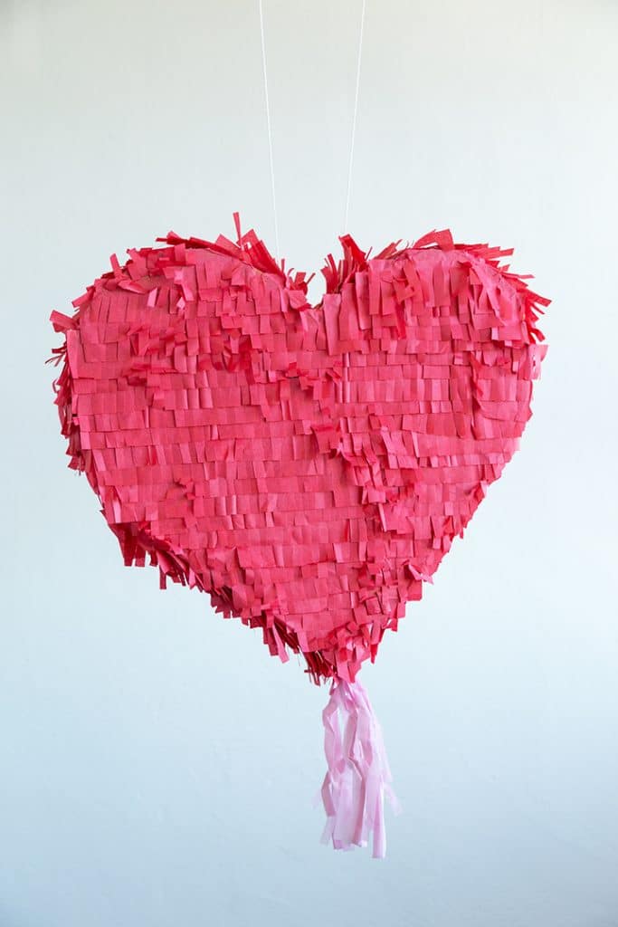 Make a heart shaped piñata for Valentine's Day party