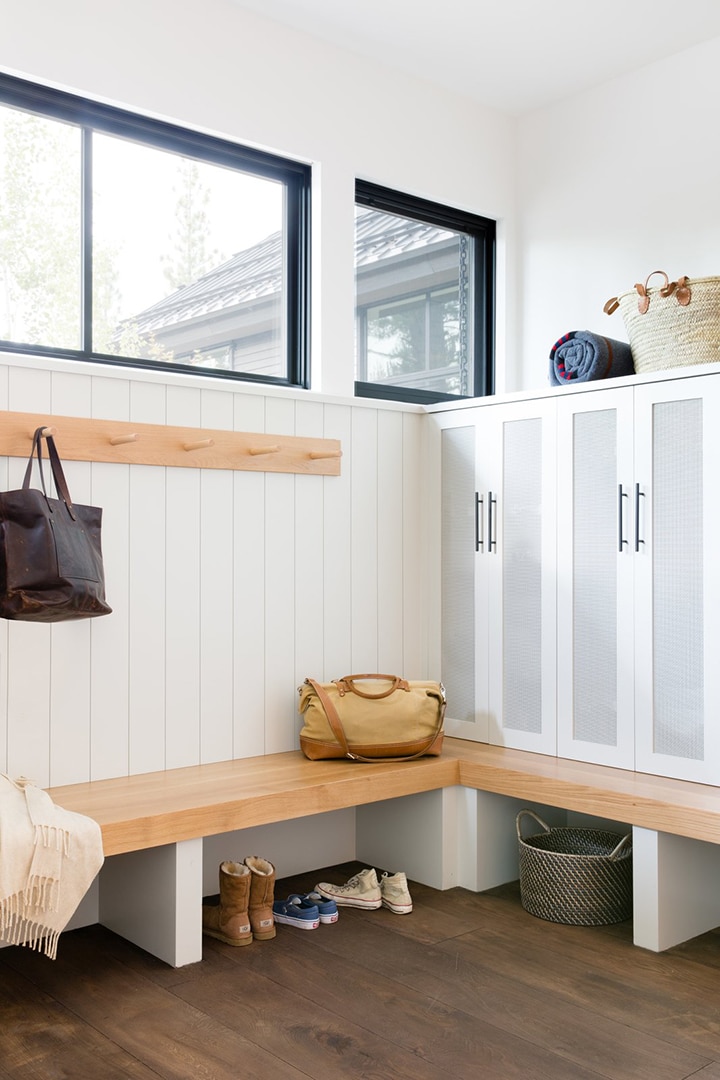 Love this mudroom with mix of open hooks and closed lockers