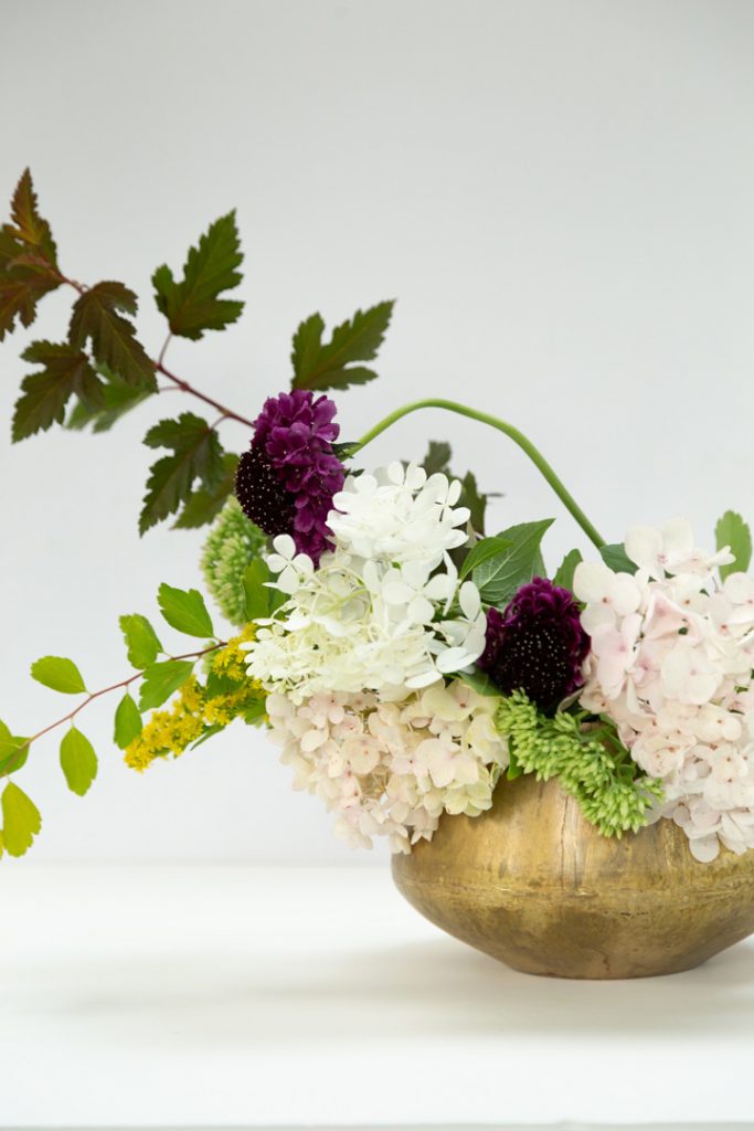 flower arrangement brass bowl