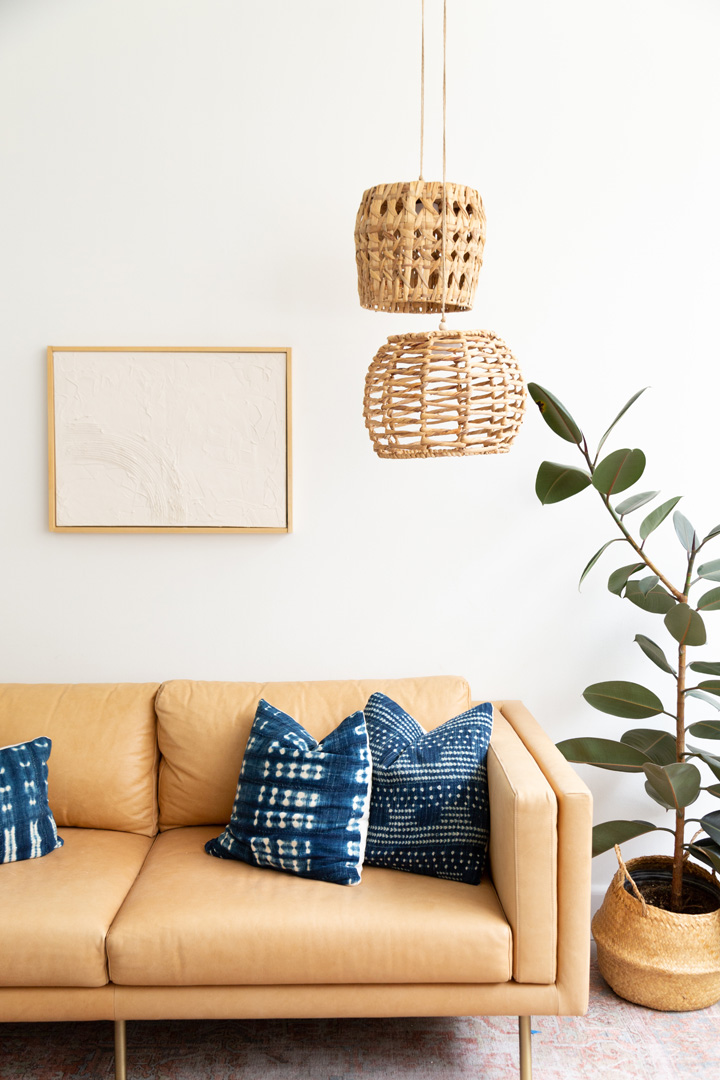 leather couch with hanging basket lights