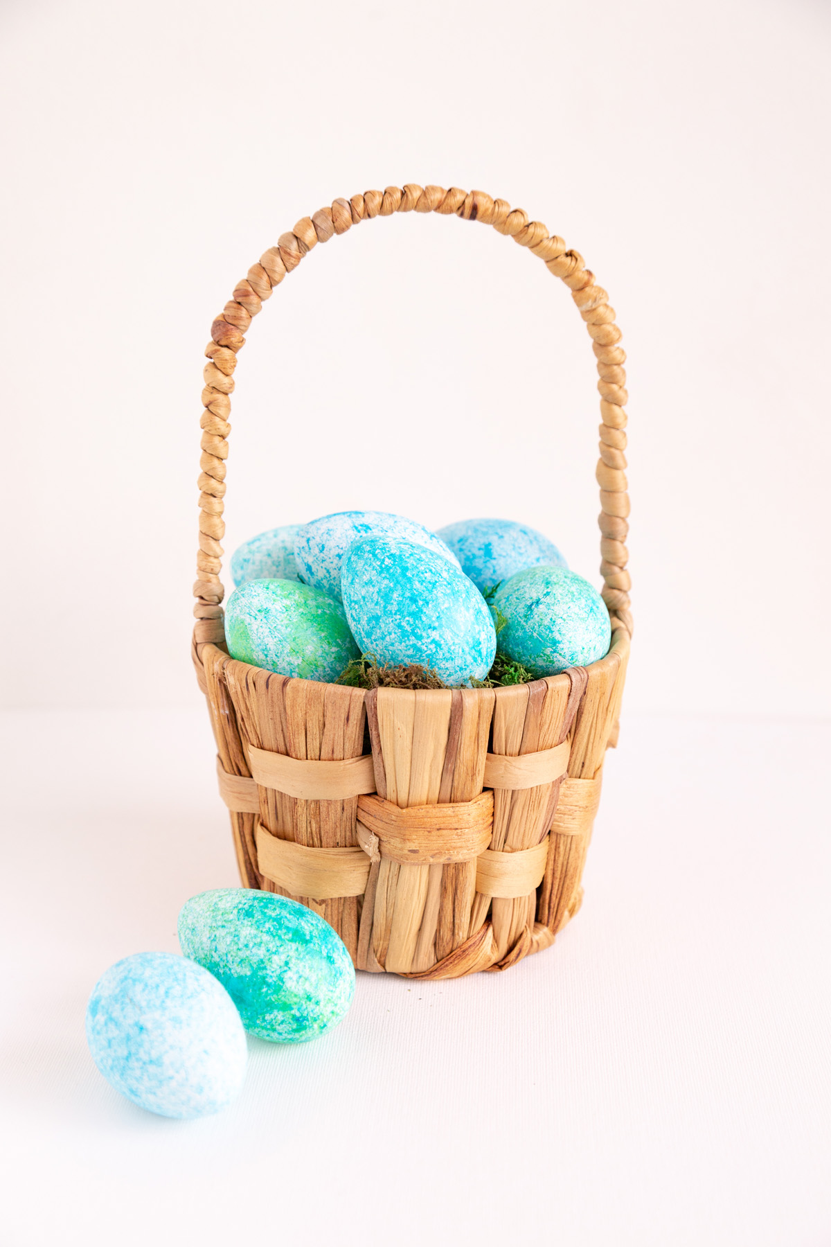 speckled eggs in basket